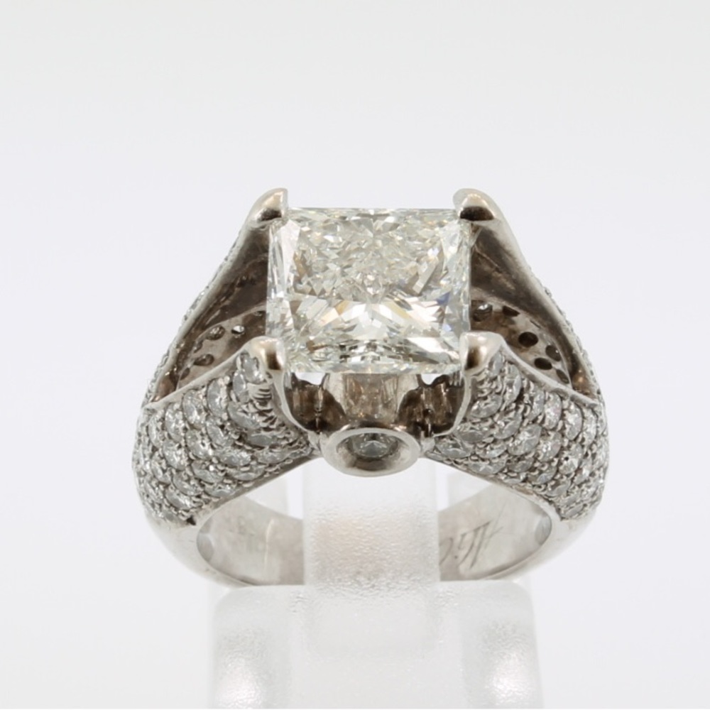 3.46ct diamond set in an 18kt WG mounting with 2.02 ctw. 5.48 carats total.